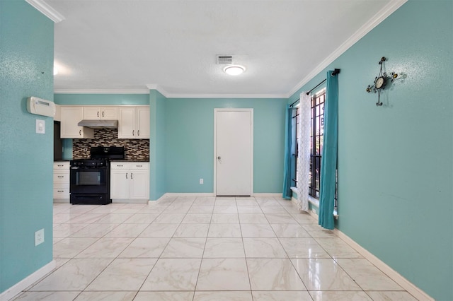 kitchen featuring white cabinets, black range, crown molding, and tasteful backsplash