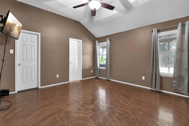 interior space with vaulted ceiling and ceiling fan