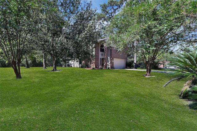 view of yard with a garage