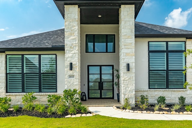 doorway to property with french doors