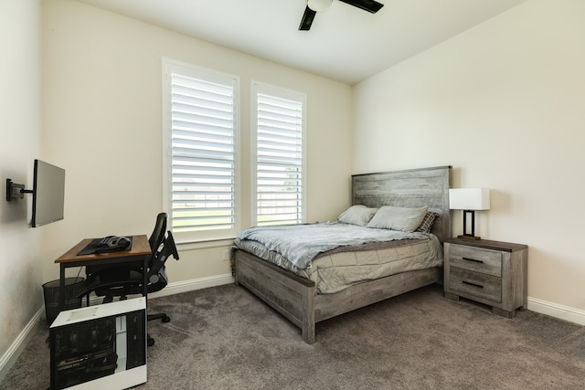 bedroom featuring dark carpet and ceiling fan