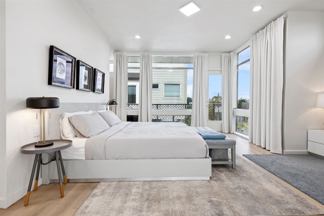 bedroom with light hardwood / wood-style flooring