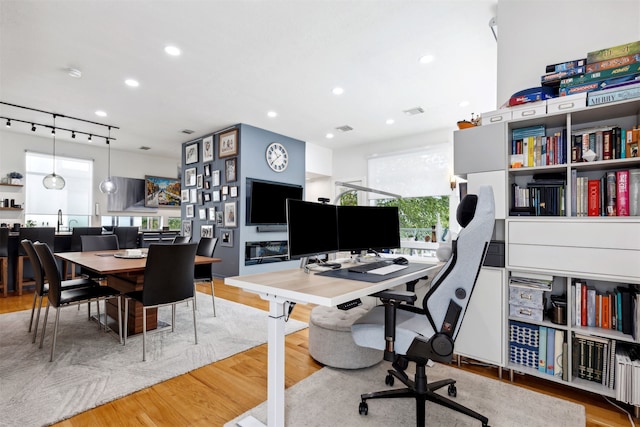 home office featuring light wood-type flooring