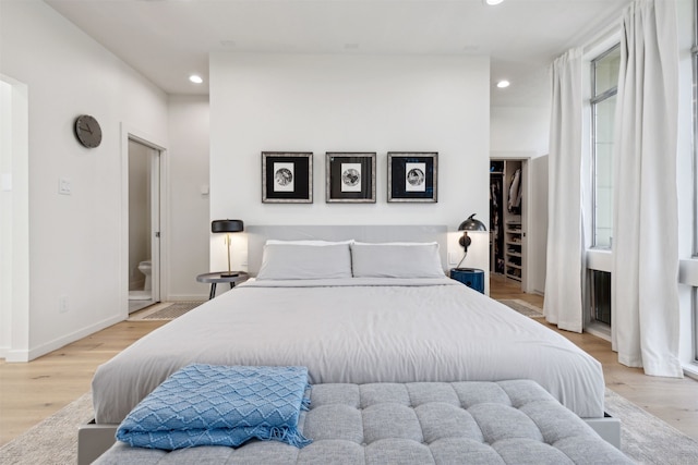 bedroom with light hardwood / wood-style flooring