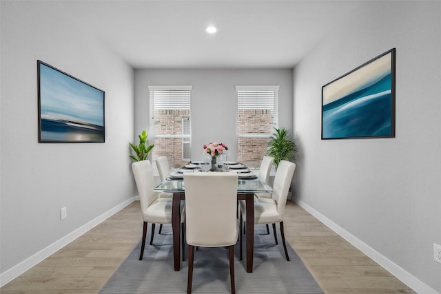 dining room featuring light hardwood / wood-style flooring