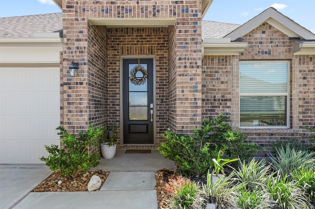 property entrance with a garage