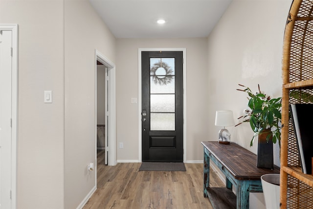 entryway with light hardwood / wood-style flooring