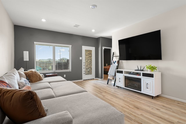 living room featuring light hardwood / wood-style flooring