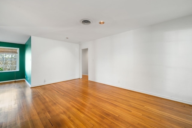 empty room with light wood-type flooring