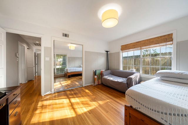 bedroom with light hardwood / wood-style floors