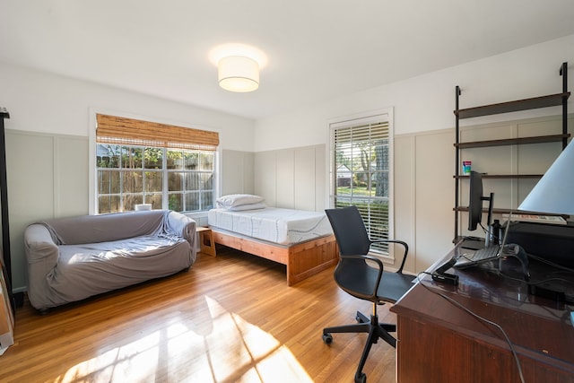 bedroom with light hardwood / wood-style floors