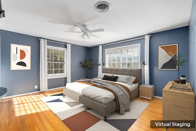 bedroom featuring ceiling fan and light wood-type flooring