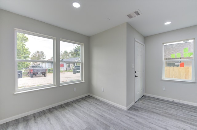 empty room with light wood-type flooring