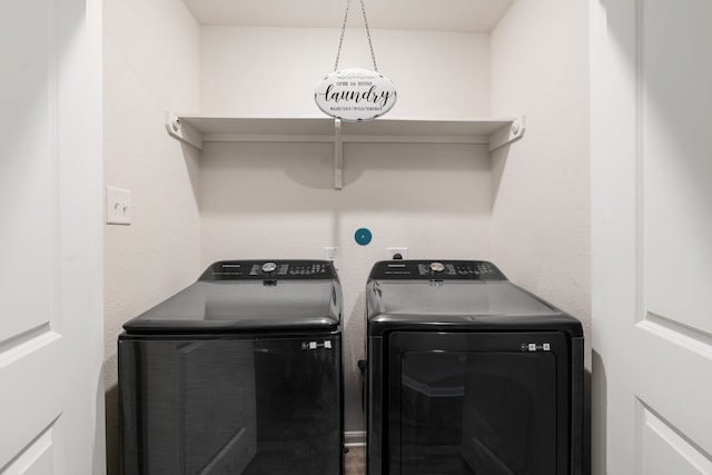 laundry room with washer and clothes dryer