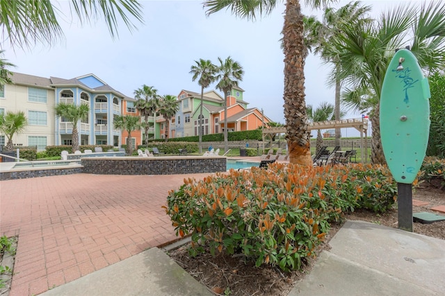 7000 Seawall Blvd Unit 1036, Galveston, TX 77551 - view of property's community with a residential view and a pool