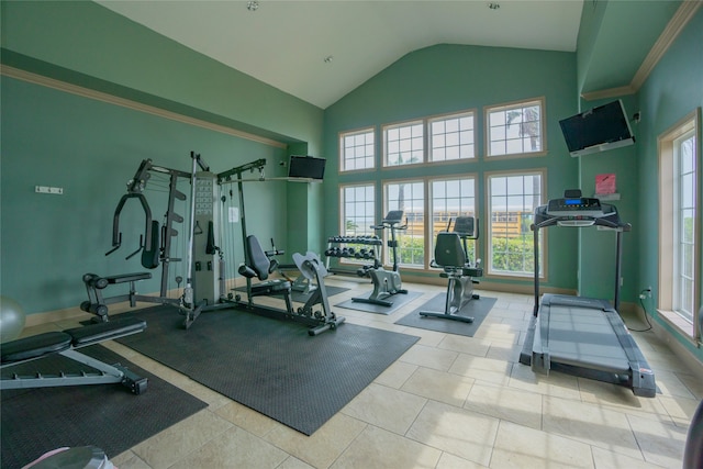 exercise room with a towering ceiling