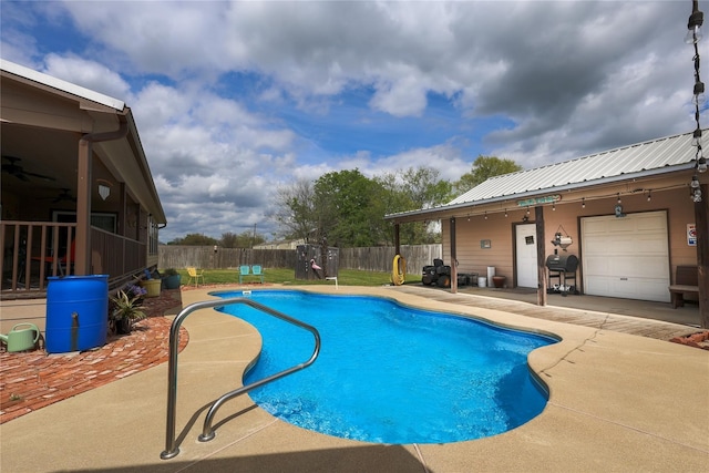 view of swimming pool featuring a patio area