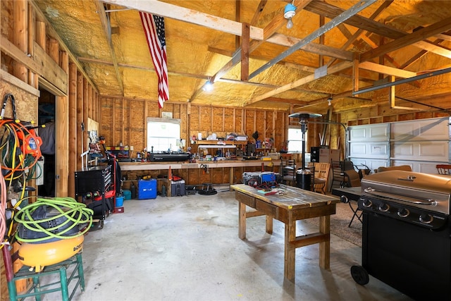 garage with a workshop area