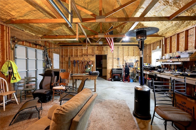 garage with a workshop area