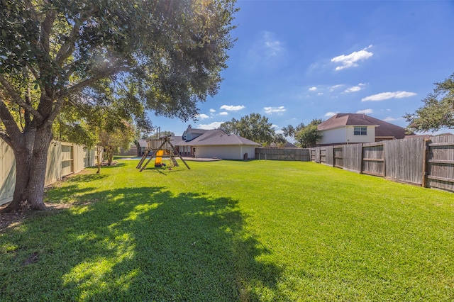 view of yard with a playground