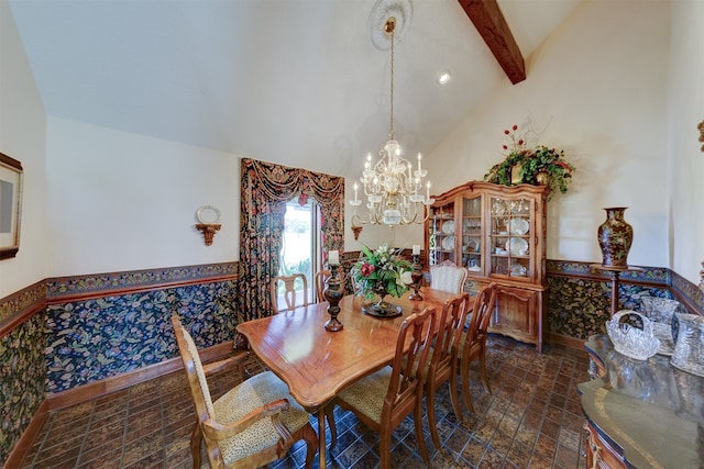 dining room with vaulted ceiling with beams and a notable chandelier