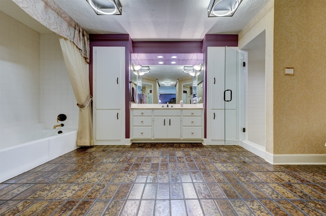 bathroom featuring vanity and a textured ceiling