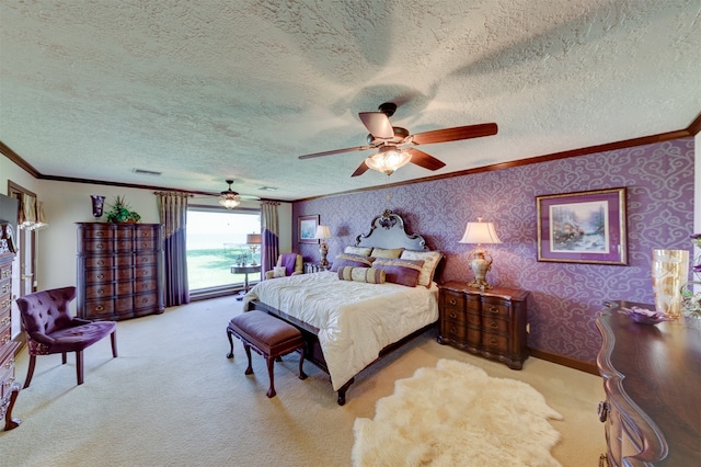 bedroom with ceiling fan, crown molding, and a textured ceiling