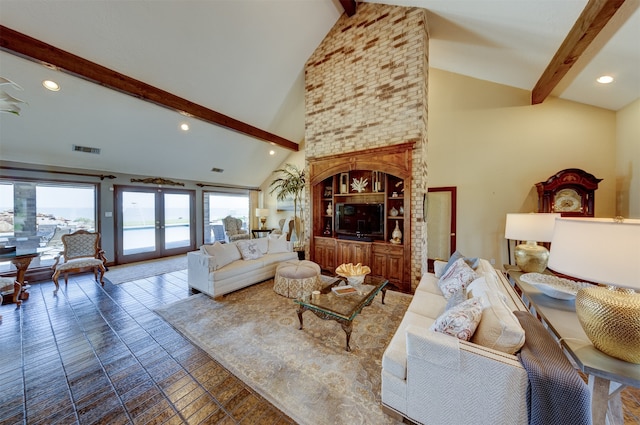 living room with french doors and lofted ceiling with beams