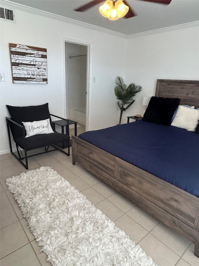 bedroom featuring ornamental molding, ceiling fan, and light tile patterned floors