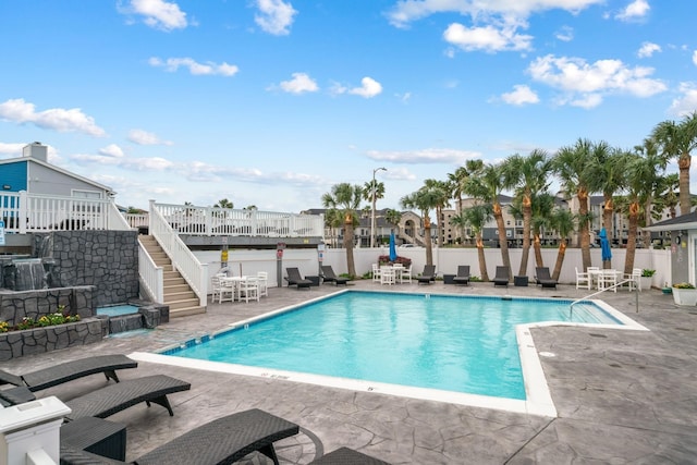 view of swimming pool featuring a patio