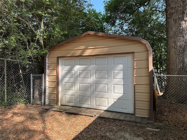 detached garage with fence