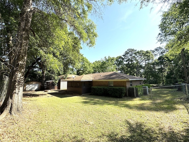 exterior space with fence and a gate