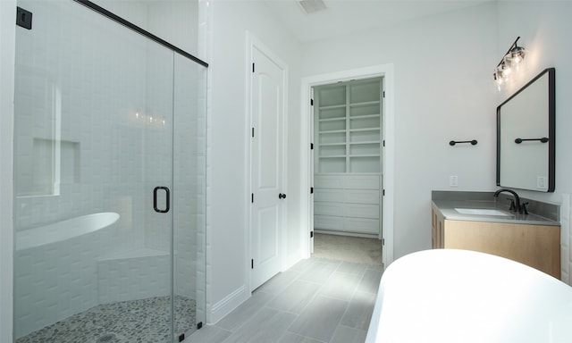 bathroom with vanity and an enclosed shower