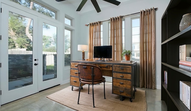 office with ceiling fan, plenty of natural light, and french doors