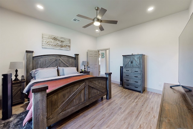 bedroom featuring light wood-type flooring and ceiling fan