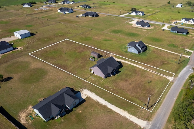 drone / aerial view with a rural view