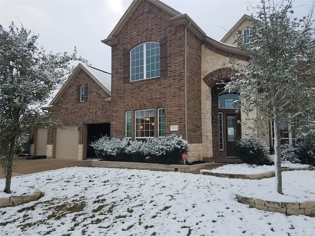 view of front of property with a garage