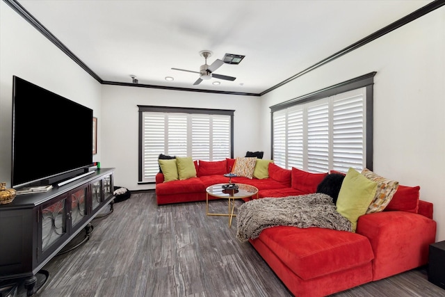 living room with crown molding, ceiling fan, and dark wood-type flooring