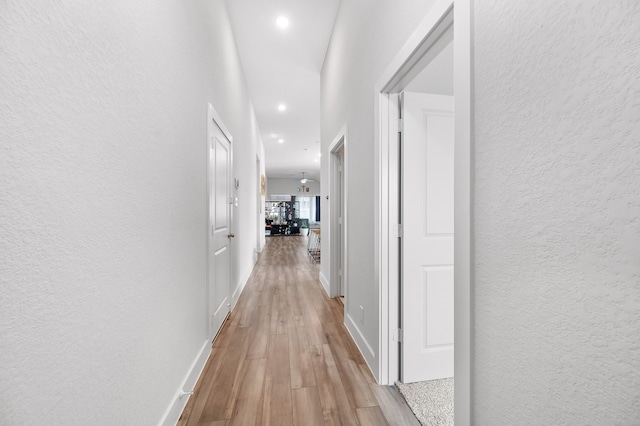 hallway featuring light wood-type flooring