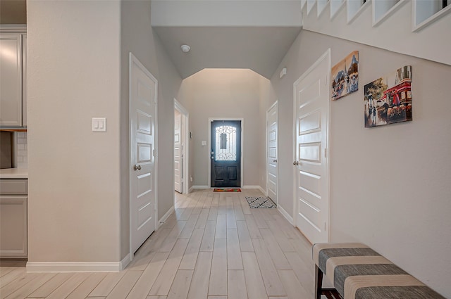 foyer entrance featuring light wood-type flooring