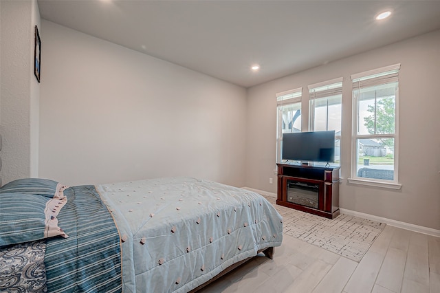 bedroom featuring light hardwood / wood-style floors