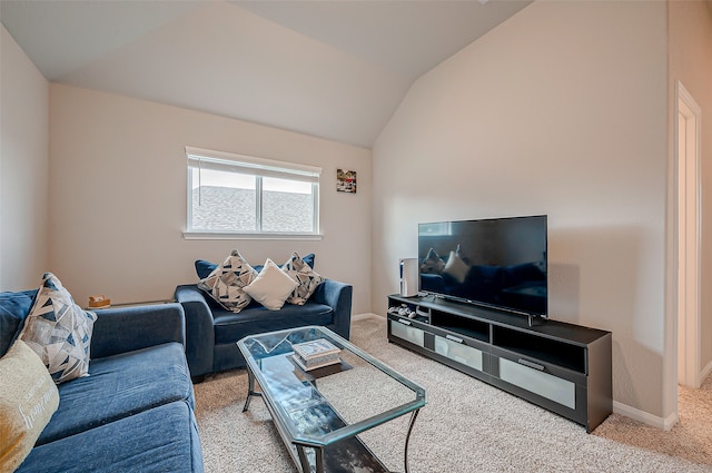 carpeted living room featuring vaulted ceiling