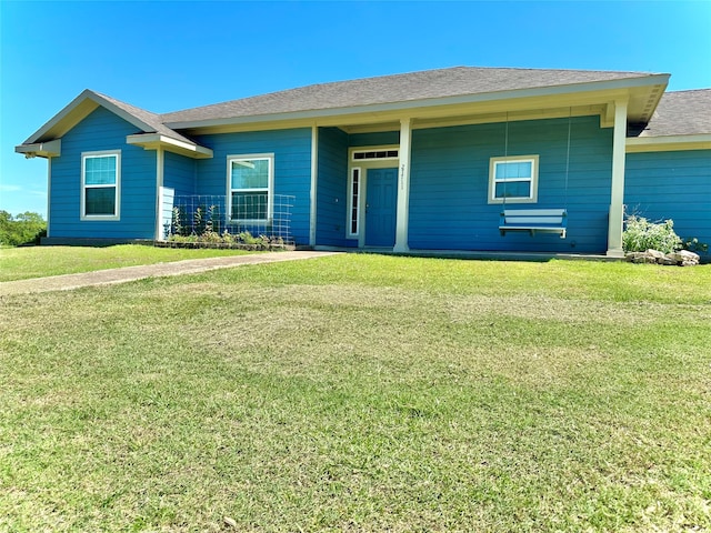 ranch-style house with a front yard