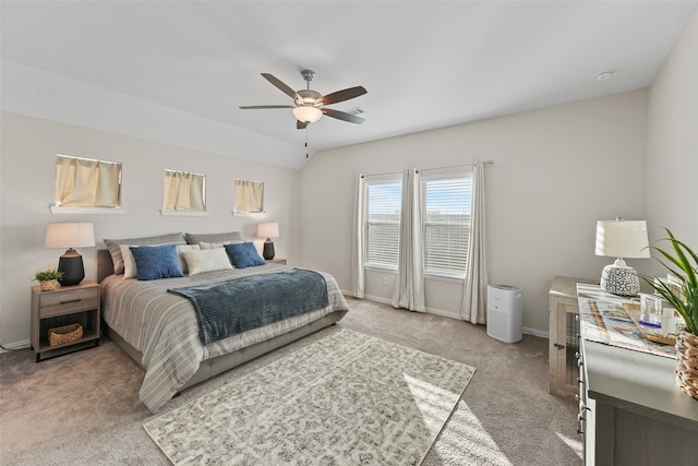 bedroom featuring light carpet and ceiling fan