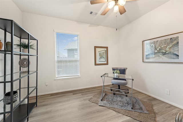 office featuring light hardwood / wood-style flooring and ceiling fan