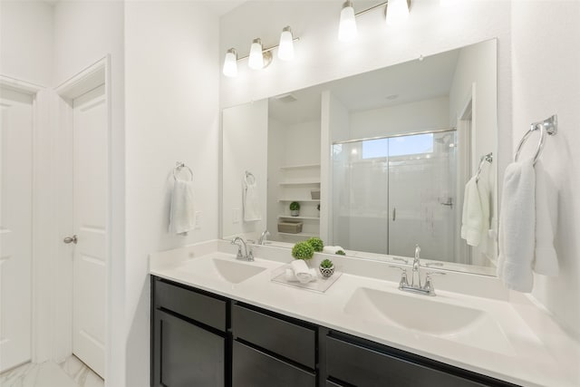 bathroom with vanity and an enclosed shower