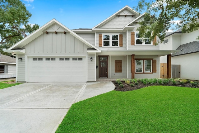 craftsman-style house with a garage and a front yard