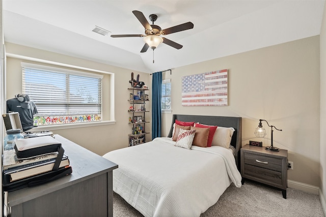 bedroom with ceiling fan and light colored carpet