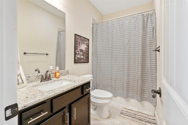 full bathroom featuring shower / tub combo, vanity, toilet, and tile patterned floors