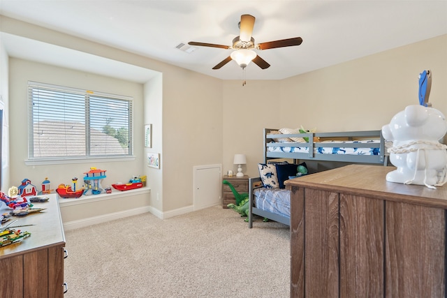 carpeted bedroom with ceiling fan